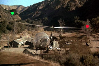 Вид с вертолетной площадки на лагерь и восточный въезд.
